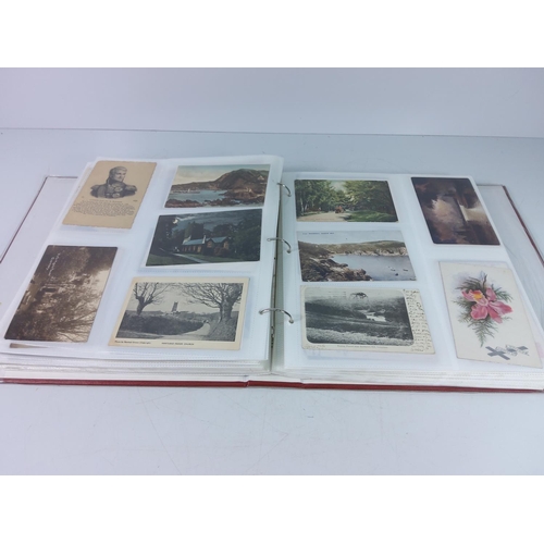 109 - Large album of postcards