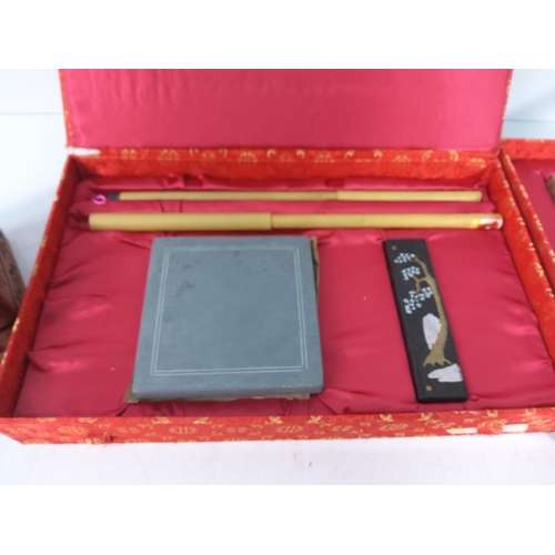 144 - Oriental seal set, writing set and an inlaid wooden box