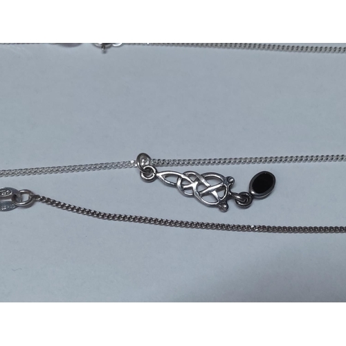 220 - 3 silver pendants of chains