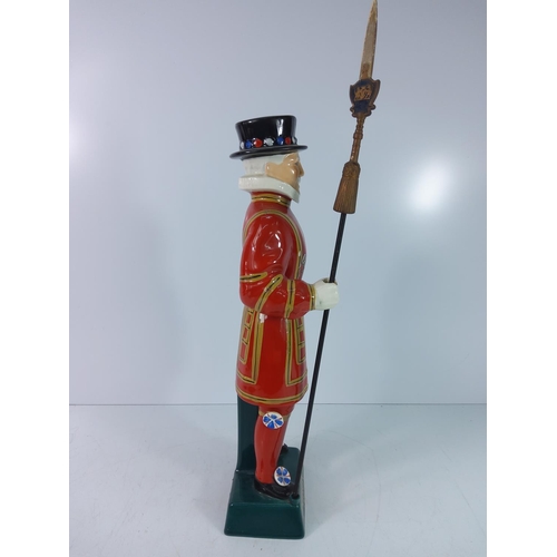 278 - Carlton ware Beefeater decanter, 49cms in height