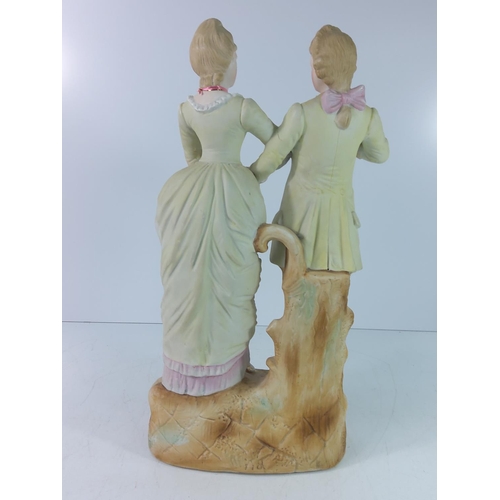 279 - Bisque porcelain couple, 40cms in height