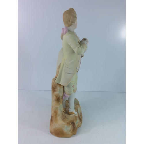 279 - Bisque porcelain couple, 40cms in height