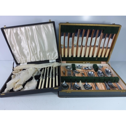 14 - 2 boxed cutlery sets