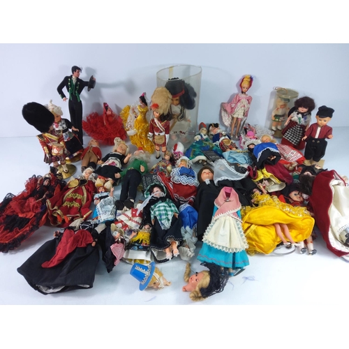 45 - Suitcase of costume dolls