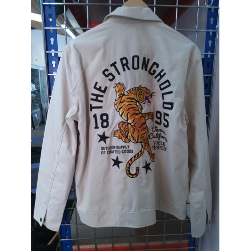 70 - Stronghold new and tagged jacket with embroidered back