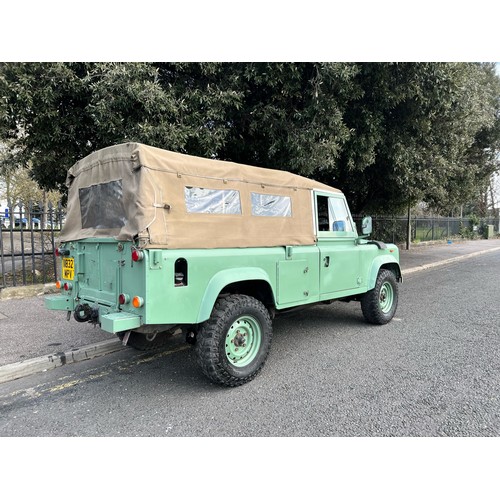 28 - 1995 Land Rover Defender 110  ex Military with canvas roof, with Heritage external colours. Having u... 