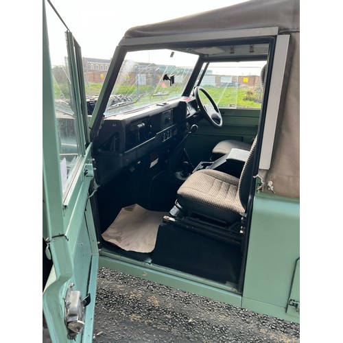 28 - 1995 Land Rover Defender 110  ex Military with canvas roof, with Heritage external colours. Having u... 