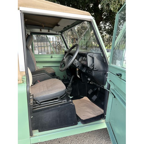 28 - 1995 Land Rover Defender 110  ex Military with canvas roof, with Heritage external colours. Having u... 