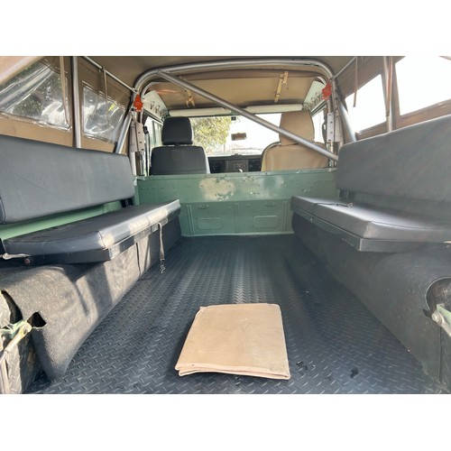 28 - 1995 Land Rover Defender 110  ex Military with canvas roof, with Heritage external colours. Having u... 