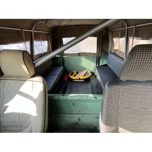 28 - 1995 Land Rover Defender 110  ex Military with canvas roof, with Heritage external colours. Having u... 