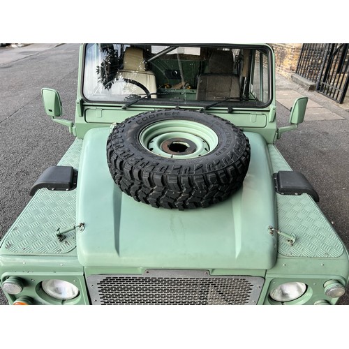 28 - 1995 Land Rover Defender 110  ex Military with canvas roof, with Heritage external colours. Having u... 