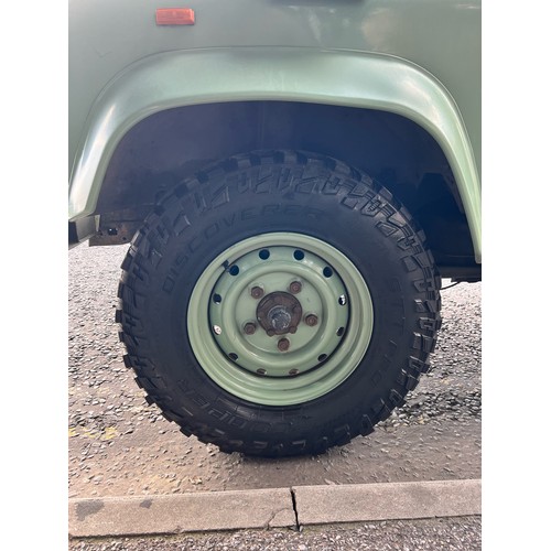 28 - 1995 Land Rover Defender 110  ex Military with canvas roof, with Heritage external colours. Having u... 