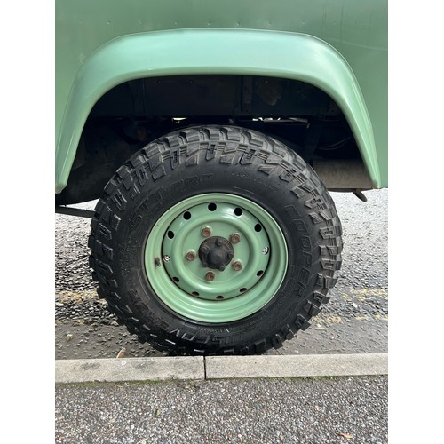 28 - 1995 Land Rover Defender 110  ex Military with canvas roof, with Heritage external colours. Having u... 