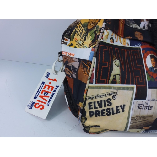 102 - Elvis holdall with luggage tag