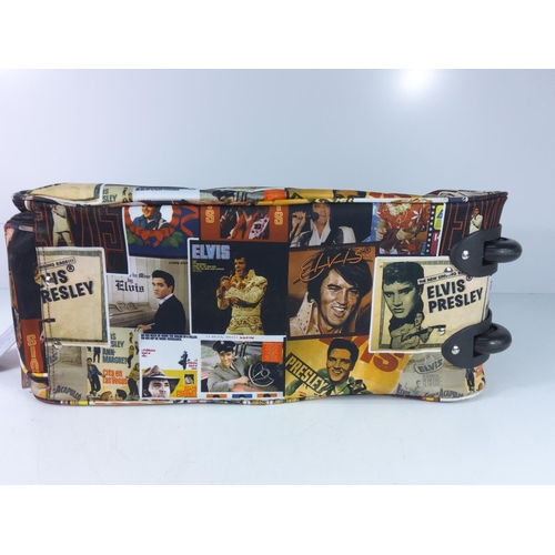 102 - Elvis holdall with luggage tag