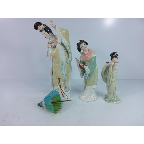 449 - 3 Oriental lady figures