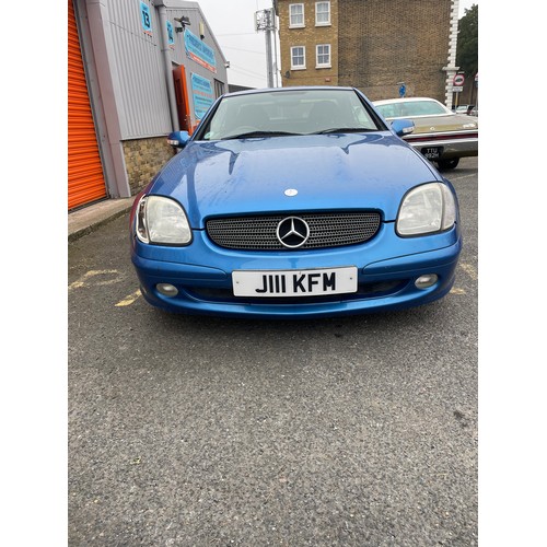 33 - 2001 Blue Mercedes SLK 230, 93,339 miles, 2.3L RWD, needs a small amount of work but runs and drives... 