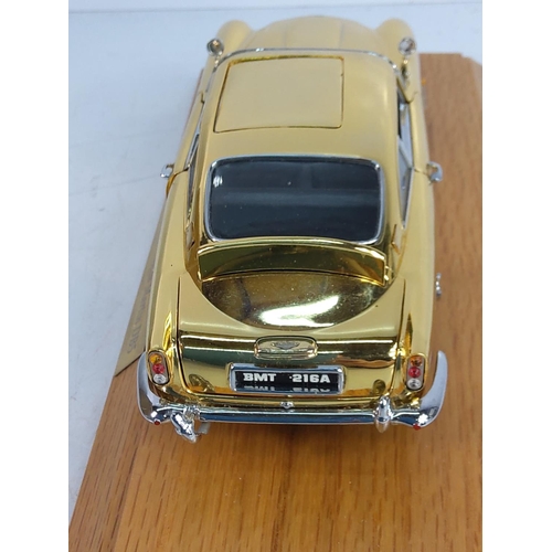 197 - Boxed cased collectors James Bond gold plated Astin Martin DB5