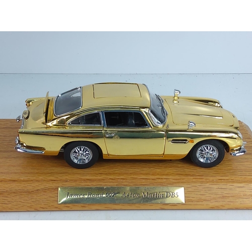 197 - Boxed cased collectors James Bond gold plated Astin Martin DB5