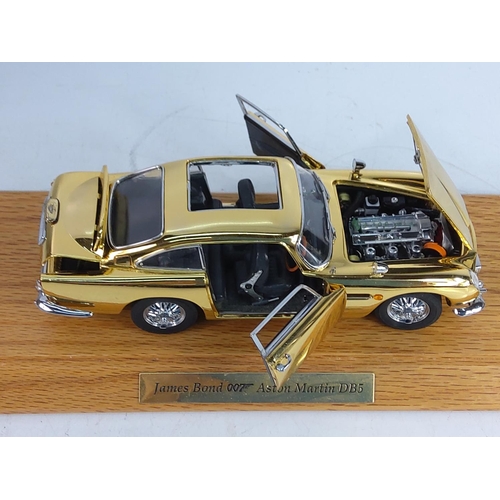 197 - Boxed cased collectors James Bond gold plated Astin Martin DB5