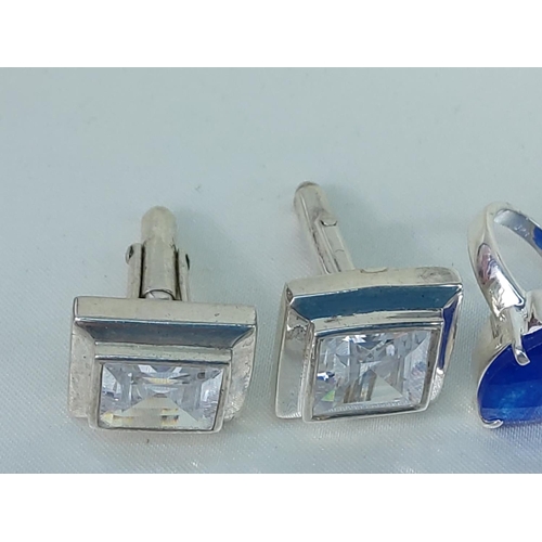 246 - 7 rings, pair of cufflinks, and stone set earrings, all silver