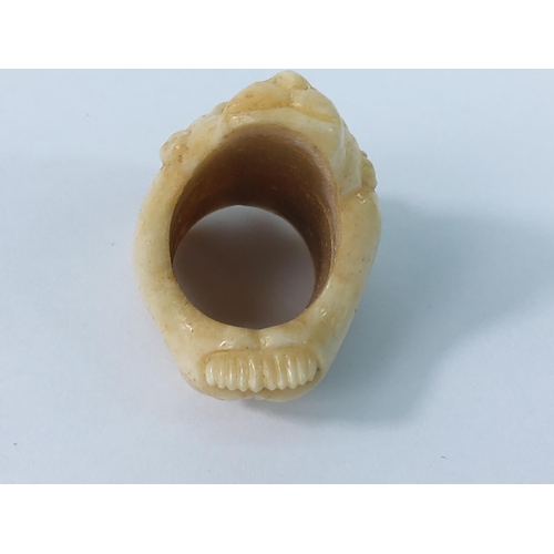 263 - Carved bone ring and manicure item