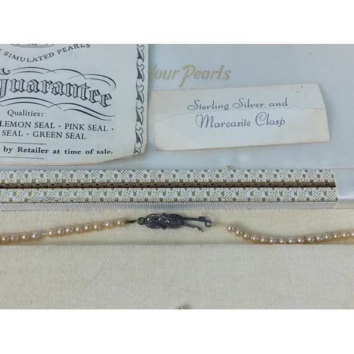 270 - 2 strings of pearls