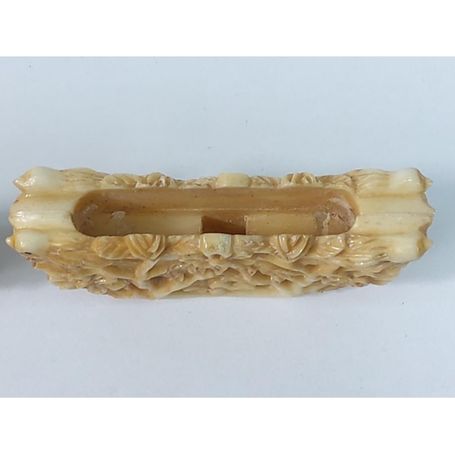 285 - 2 bone carvings