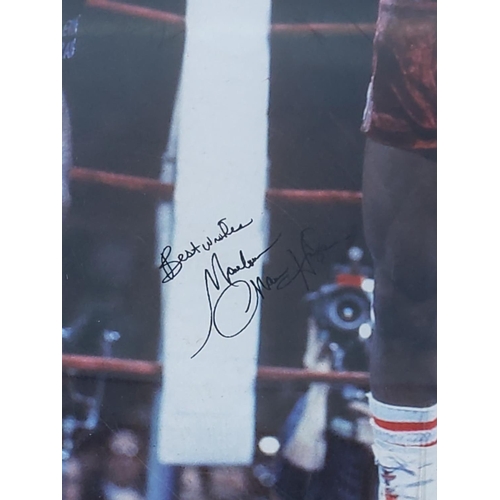 131 - Signed framed boxing photograph