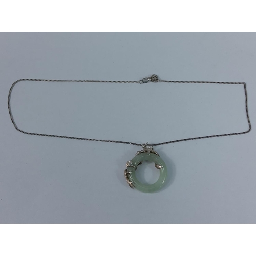 303 - Jade and silver pendant on chain