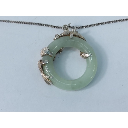 303 - Jade and silver pendant on chain