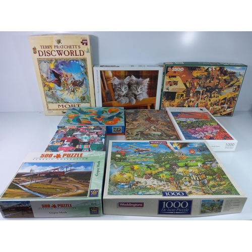 243 - Large qty of various jigsaw puzzles