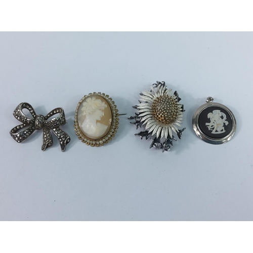 380 - 4 brooches