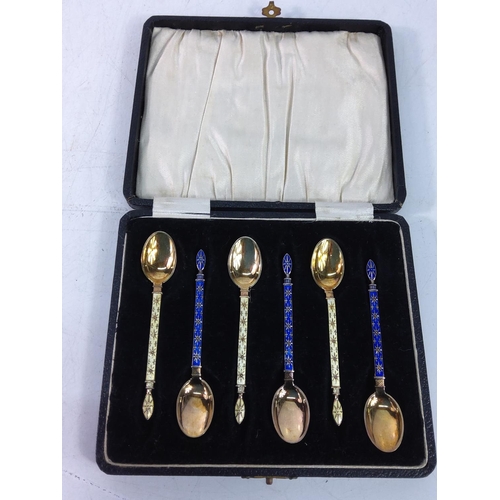 Cased set of 6 silver and enamelled spoons, gross weight 49.3g