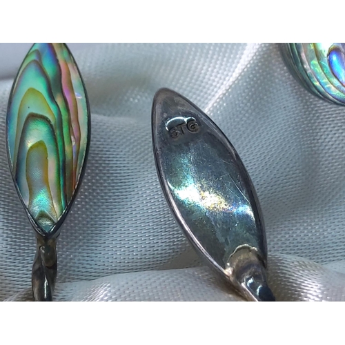 403 - Cased set of 6 silver and shell spoons plus one other silver and shell spoon, gross weight 31.6g