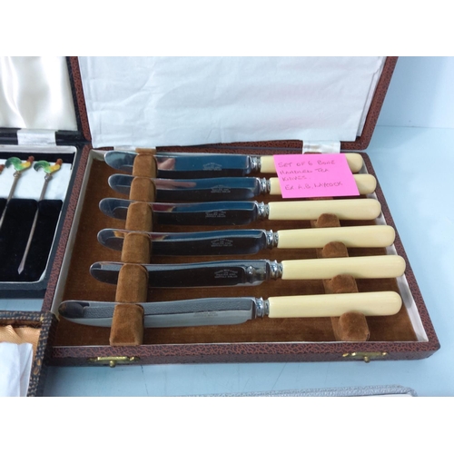 413 - 6 x various boxed cutlery and a fruit knife