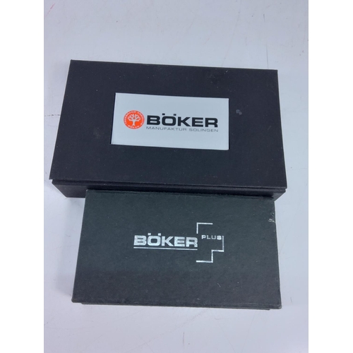 417 - 2 boxed Boka knives