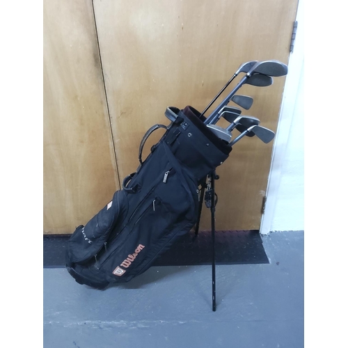 86 - 2 golf bags and clubs