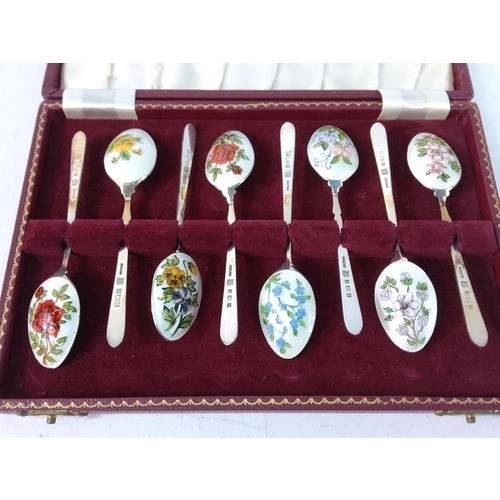 405 - Cased set of 8 silver and enamel floral tea spoons, gross weight 90g