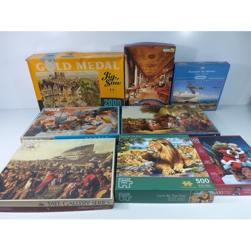 243 - Large qty of various jigsaw puzzles