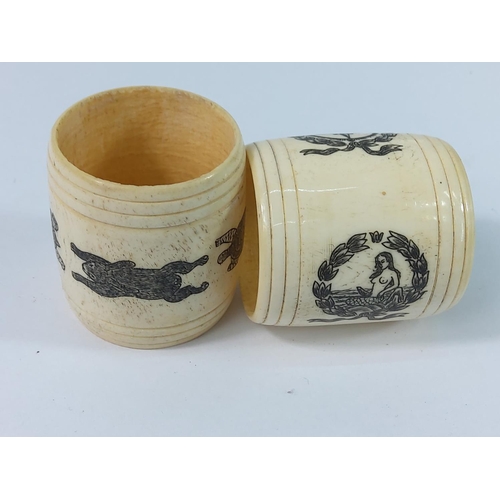 411 - Pair of carved bone napkin rings