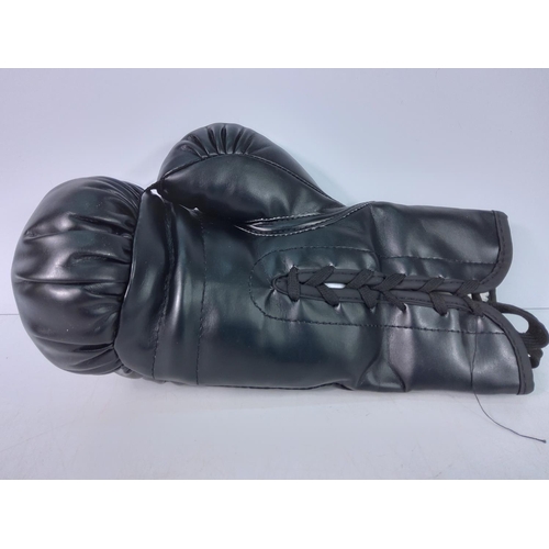 199 - Signed black Everlast boxing glove without certificate