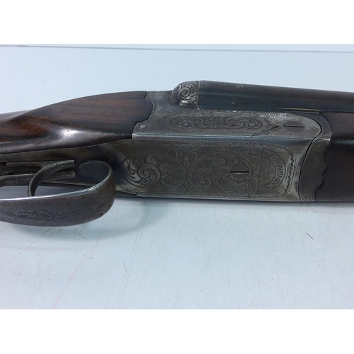 205 - 12 bore double barrelled, double trigger deactivated with certificate