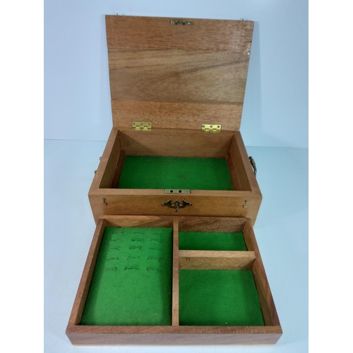 74 - 2 jewellery boxes and a wooden cased clock