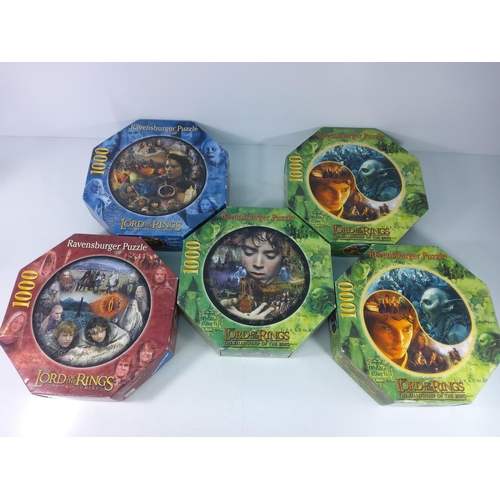 314 - Puzzles and toys including 5 Lord of the Rings puzzles