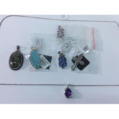 386 - Box of silver pendants and jewellery