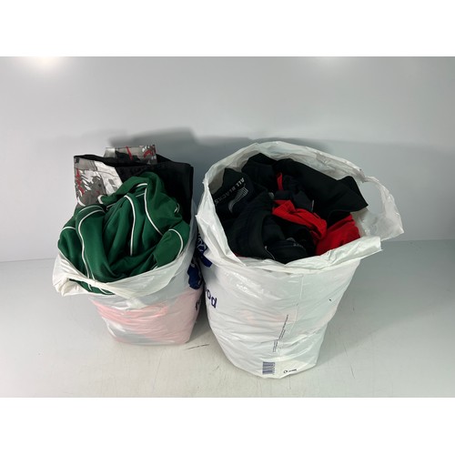 18 - Bicycle clothing including new and tagged (over 15 cycle tops - approximately 25 items in total)