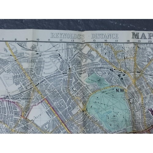 450 - New Edition Reynolds 1891 shilling coloured Map of London with omnibus and tramcar routes.  Map size... 