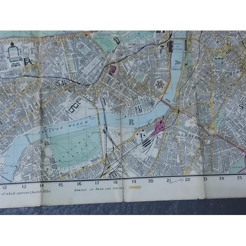 450 - New Edition Reynolds 1891 shilling coloured Map of London with omnibus and tramcar routes.  Map size... 