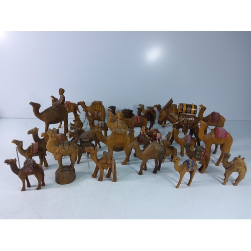 492 - Large qty of wooden camels